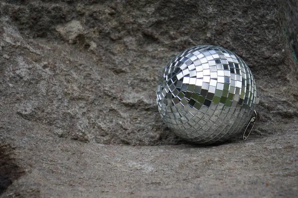 Close up of a disco ball on the ground