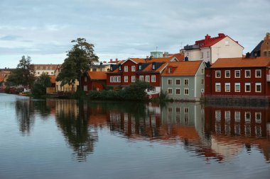 View of buildings by the canal in Eskilstuna  clipart