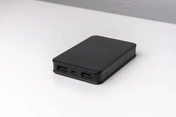 stock image Black power bank isolated on white