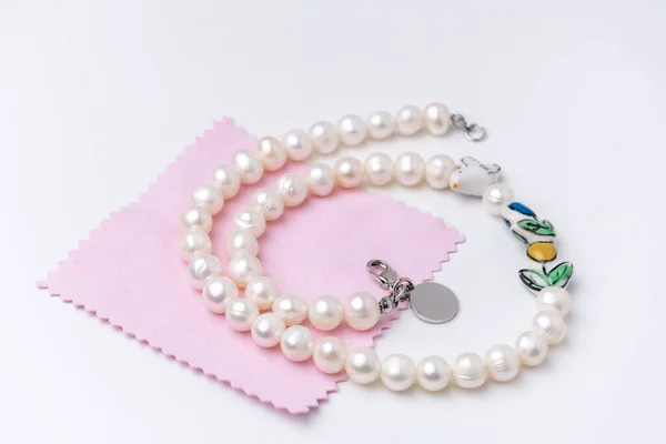 pearls string and jewelry polishing cloth