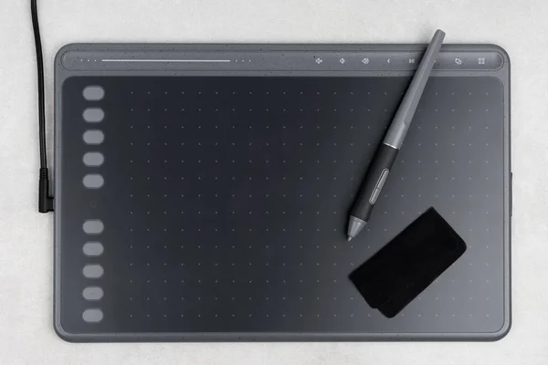 Top View Drawing Tablet Stylus Piece Fabric Grey Background — Stock Photo, Image