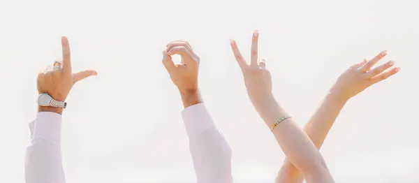 stock image Human hands with the word love on a white background. Hand gestures making the word LOVE isolated on white background. The word of love, which is created with the help of men's and women's fingers.