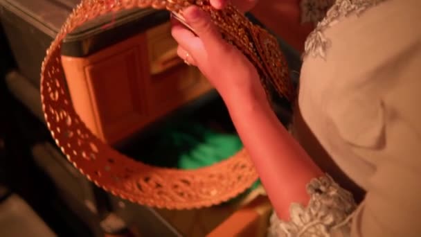 Asian Woman Takes Green Scarf Golden Belt Storage Drawer Her — Stock Video