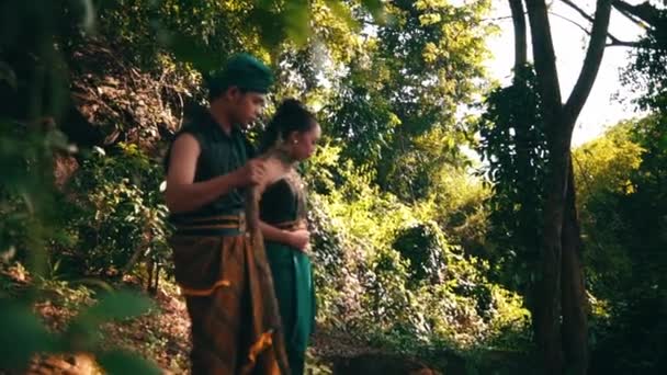 Asian Couple Walking Together Traditional Green Costumes Forest While Man — Stockvideo