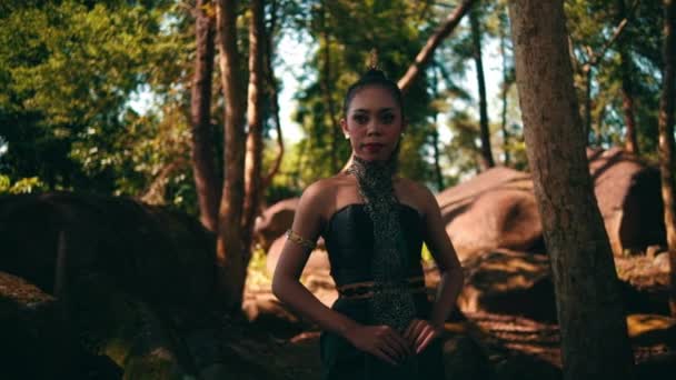 Beautiful Asian Woman Green Dress Walking Lonely Big Rocks Trees — Video