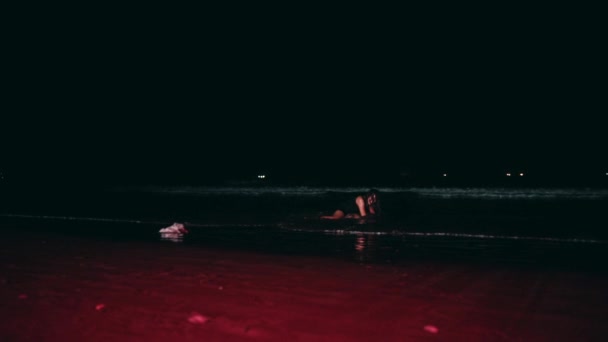 Asian Woman Black Clothes Wet Body Lying Dirty Beach Sand — Stok video