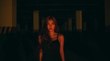 a woman with blonde hair is standing in the middle of the pentagram altar while doing devil worship at night