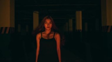 a woman with blonde hair is standing in the middle of the pentagram altar while doing devil worship at night