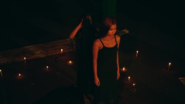 Woman Black Dress Puts Black Robe While Performing Devil Worship — Stok video
