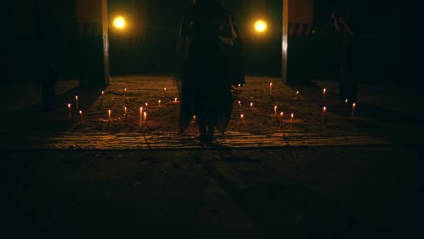 Group Satanic Cultists Walk Amidst Altar Pentagrams Lit Candles Ritual — стоковое видео