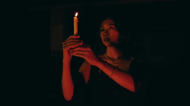 Woman Performs Satanic Ritual Movement Lit Candle Dark Night — Vídeo de stock