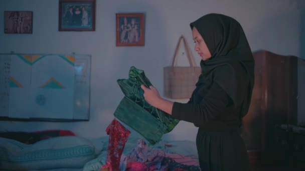Muslim Woman Found Her Favorite Clothes Pile Dirty Clothes Room — Stock Video