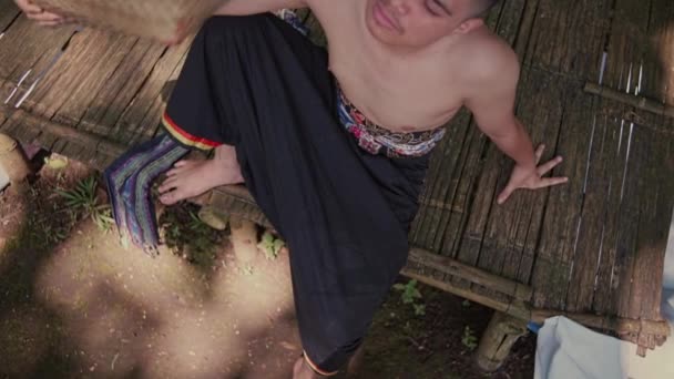 Young Asian Man Wearing Traditional Thai Clothes Sitting Bamboo Table — Stock Video