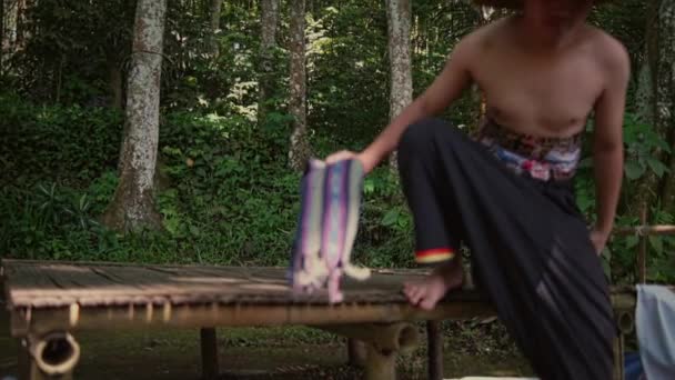 Young Asian Man Wearing Traditional Thai Clothes Sitting Bamboo Table — Stock Video