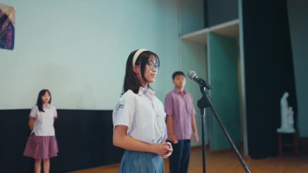High School Student Recites Poem Front Judges While Participating Competition — Stock Video