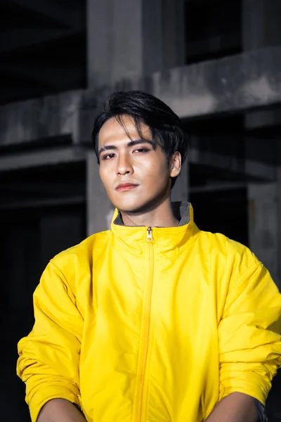 Asian Man Sleek Black Hair Wearing Yellow Jacket Jeans While — Stock Photo, Image