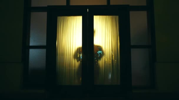 Asian Man Walks Opens Door House Equipped Yellow Lights Night — Stock Video