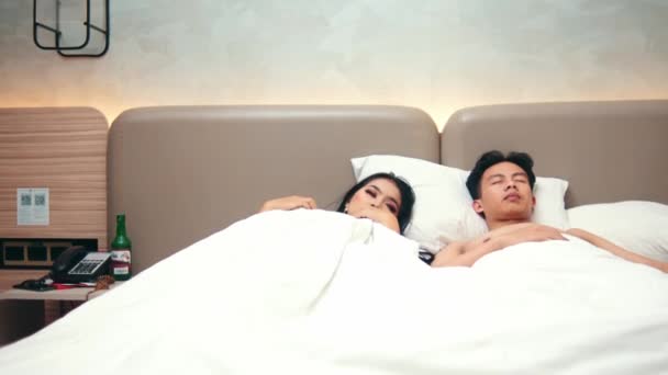 Asian Woman Terrified Sleeping Her Boyfriend White Bed Hotel Room — Stock Video