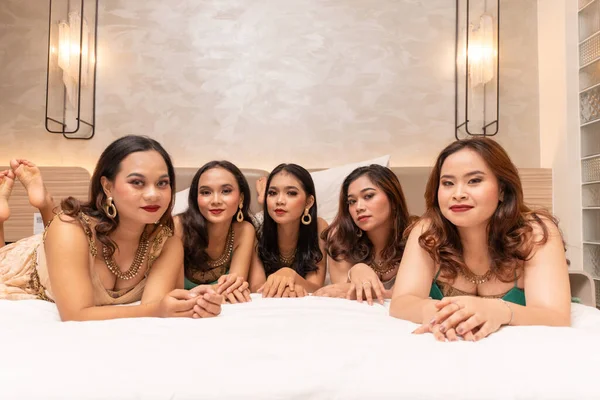 stock image a group of Asian teenage girls are staying with their friends in a luxury hotel at night