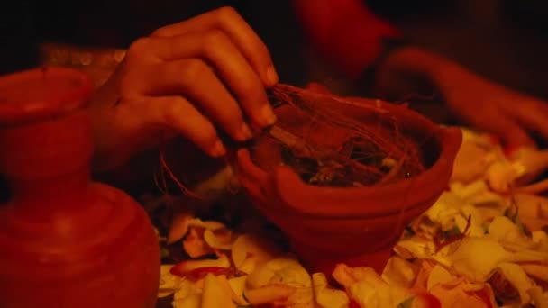 Woman Hand Putting Coconut Fiber Jug Burned Ritual Night — Stock Video