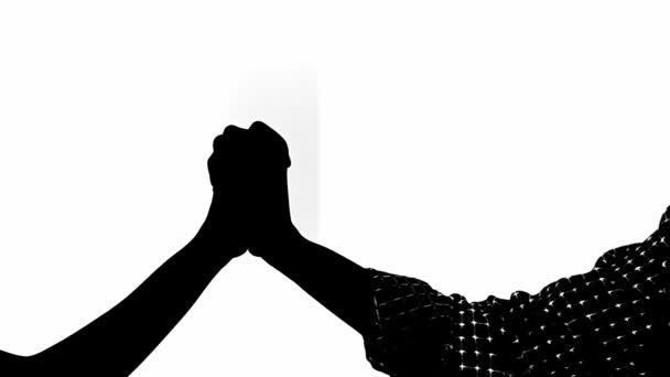 在白色背景下 用拳头碰着双手的轮廓 象征着在白色房间里的友谊或协议 — 图库视频影像
