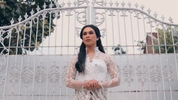 Elegant Woman White Lace Dress Standing Front Decorative Iron Gate — Stock Video