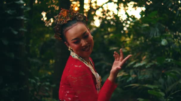 Joyful Woman Traditional Attire Dancing Outdoors Blurred Natural Background Morning — Stock Video