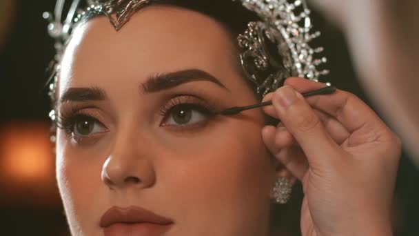 Elegant Woman Sparkling Dress Soft Focus Warm Bokeh Lights Background — Stock Video