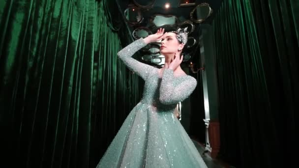 Elegant Woman Sparkling Dress Posing Dramatic Lighting Stage Green Curtains — Stock Video