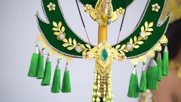 Traditional Ornate Headdress Gold Details Green Tassels Neutral Background Studio — Stock Video