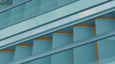 Turkuaz basamakları ve metal parmaklıkları olan modern bir yürüyen merdivenin yakın çekim görüntüsü. Görüntü geometrik desenleri ve yürüyen merdivenin çizgilerini yakalıyor, parlak tasarımını vurguluyor..