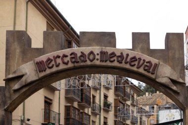 Closeup of Mercado medieval or medieval market banner at the entrance clipart