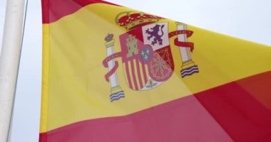 Spanish national flag waving in the wind in slow motion footage