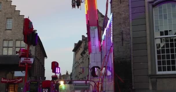 People Having Fun Enjoying Ride Fair Attraction Evening Slow Motion — Stock Video