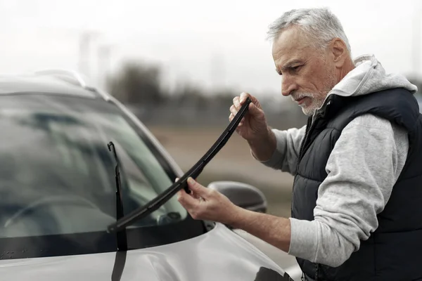 Caucasian Senior Years Old Man Driver Holding New Brand Windscreen — Stock fotografie