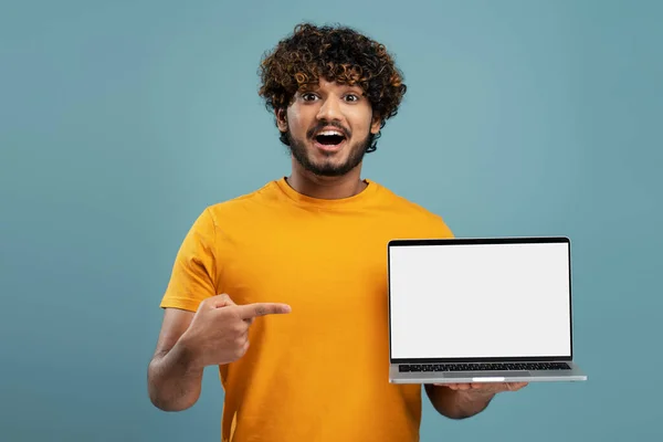 Young Excited Indian Man Holding Laptop Computer Shopping Online Pointing — Stock Photo, Image