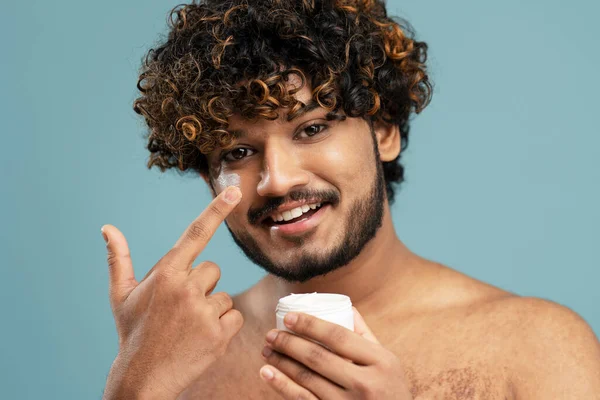 Closeup Portrait Attractive Metrosexual Indian Man Applying Aging Cream His — Stok fotoğraf