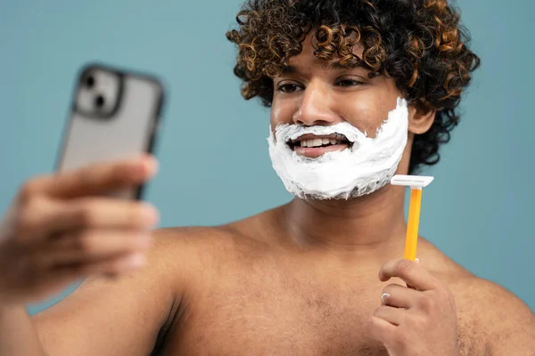 Smiling Asian Guy Curly Hair Shaving Foam His Face Using — Stock Photo, Image