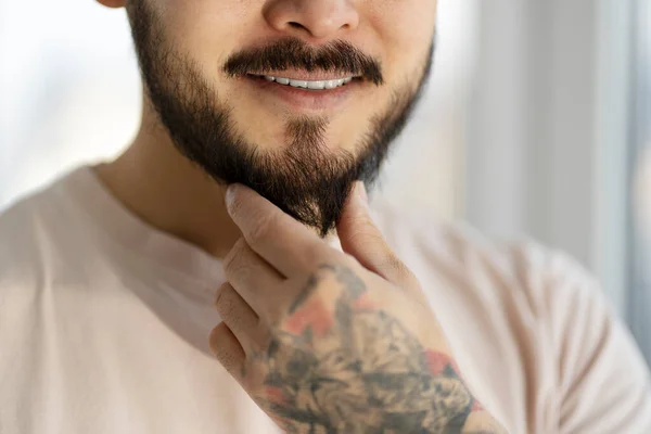 Closeup Portrait Handsome Smiling Bearded Man Stylish Tattoo Hand Touching — Photo