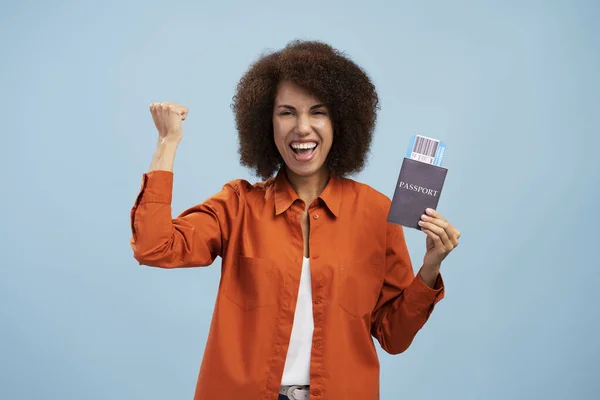 Portrait Happy Curly Haired Woman Holding Passport Rejoicing Saying Yes — Stockfoto
