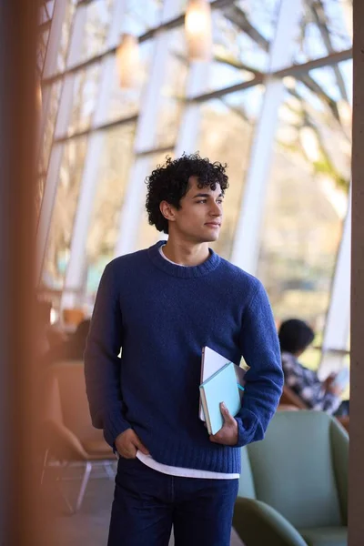 Hispanic Guy Holding Laptop Looking Aside While Visiting Library Smart — Stock Photo, Image