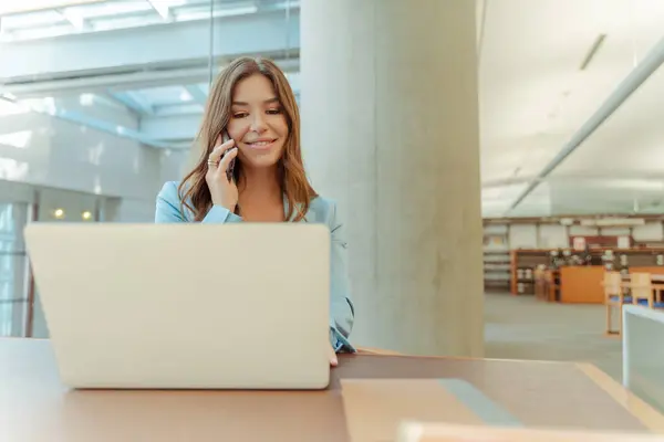 Portrait Smiling Woman Talking Mobile Phone Using Laptop Sitting Workplace — Stock Photo, Image