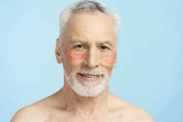Portrait Retired Man Pensioner Patches Eyes Isolated Blue Background Skin — Stock Photo, Image