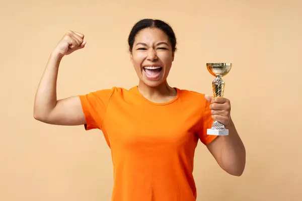 Young Overjoyed African American Woman Holding Trophy Cup Celebration Success — Stock Photo, Image