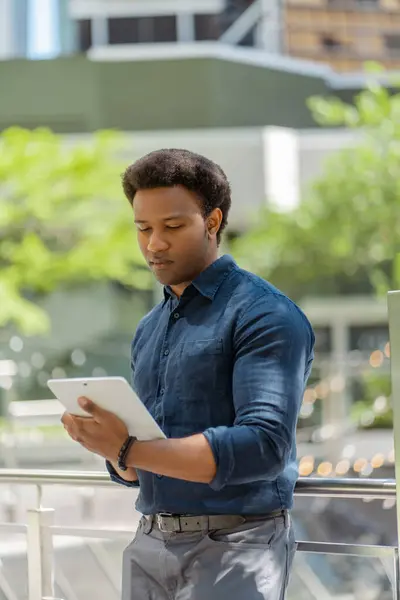 Young Attractive African American Man Holding Digital Tablet Working Online — Stock Photo, Image