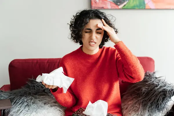 Curly Ill Young Woman Holding Paper Tissue Touching Head Feeling — Stock Photo, Image
