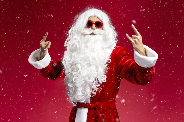 Funny Man Wearing Santa Claus Costume Stylish Glasses Showing Rock — Stock Photo, Image