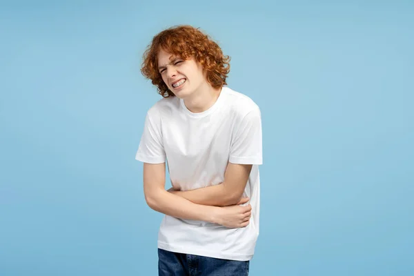 Portrait Capturing Curly Redhead Male Teen Braces Grimacing Holding His — Stock Photo, Image