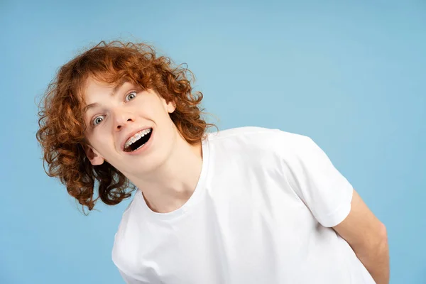 Close Redhead Teen Male Curls Dental Braces Playfully Opening His — Stock Photo, Image