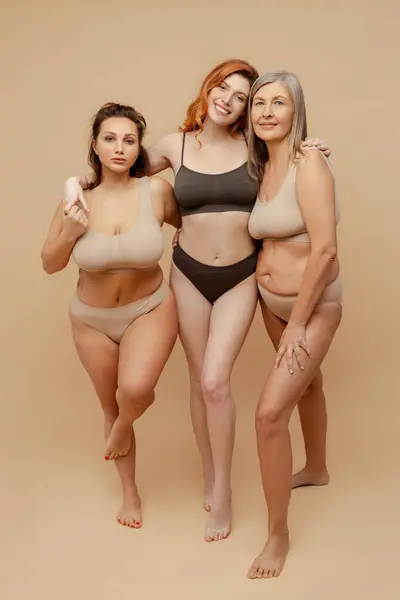 Cheerful Attractive Diverse Women Wearing Stylish Underwear Hugging Looking Camera — Stock Photo, Image